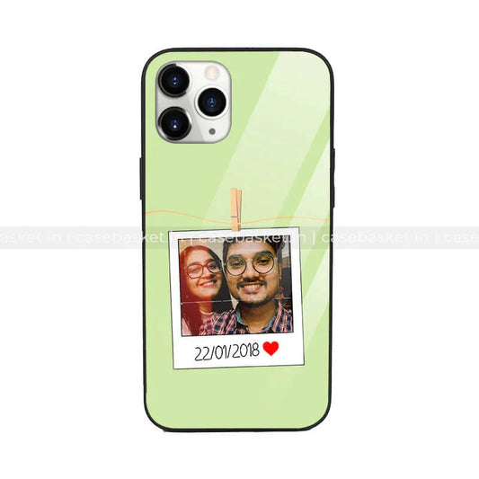 Green mobile case with polaroid-style photo and date design, protective phone cover