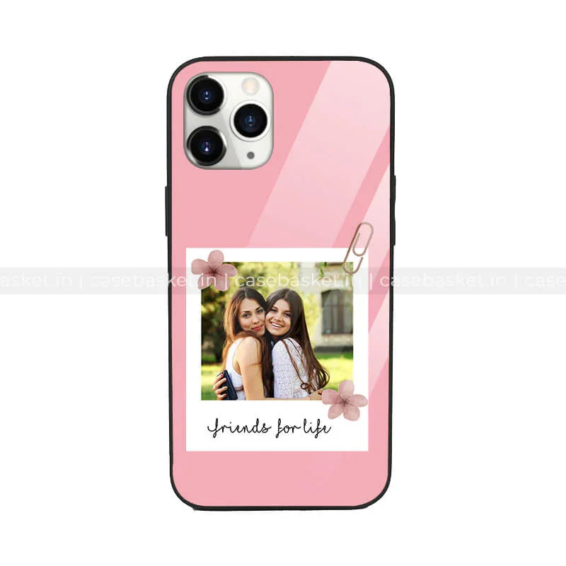 Pink phone case with Polaroid-style friends photo, floral accents, and 'friends for life' text